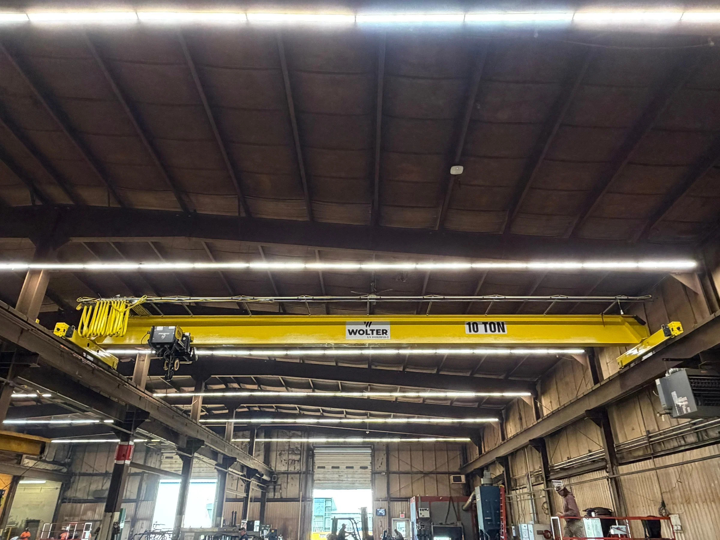 New Wolter-branded crane marked 10 ton with hoist and festoon equipment on the existing runways