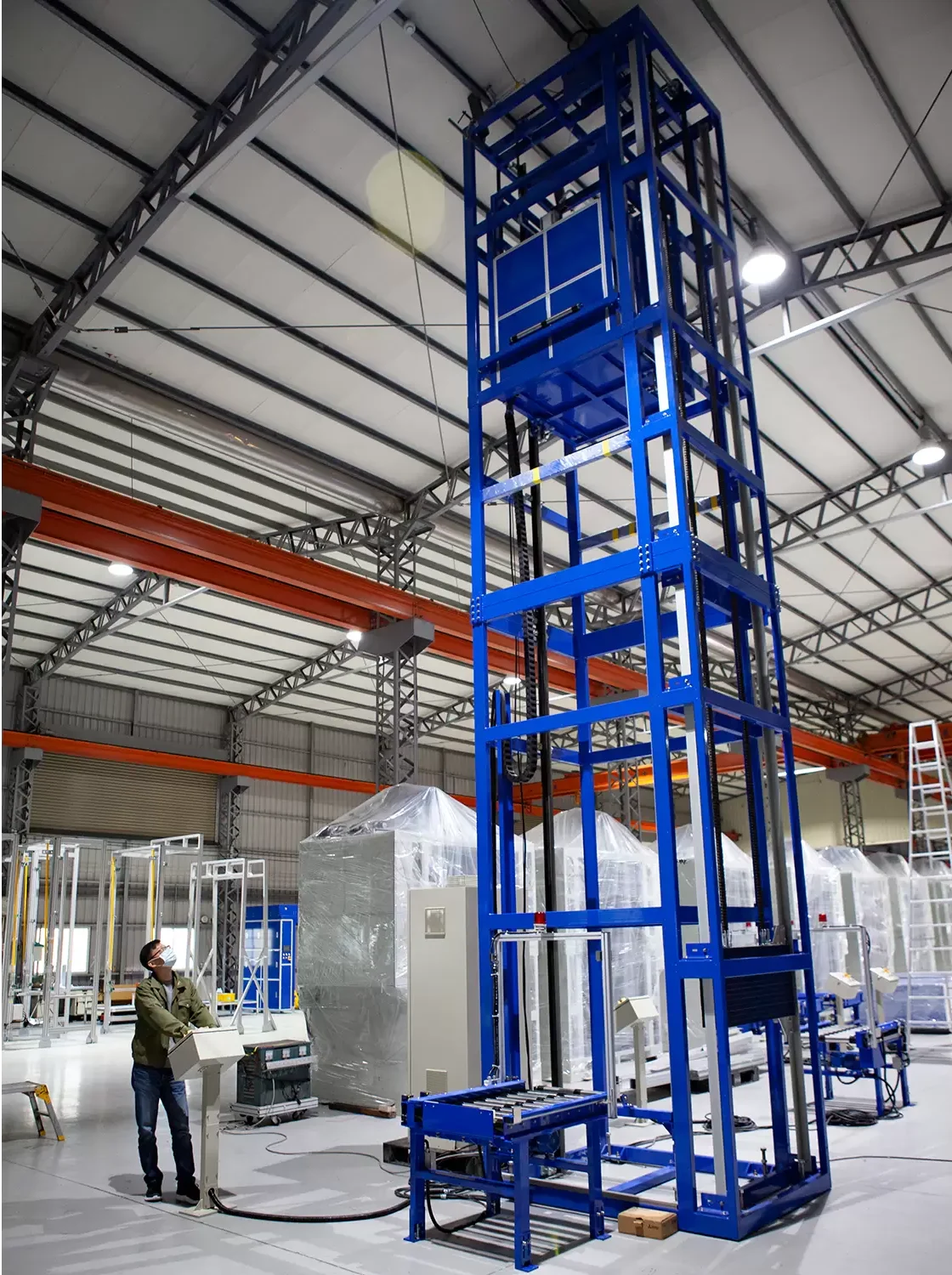 Vertical reciprocating conveyor for warehouse and distribution movement
